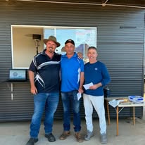 Club members receiving awards at a presentation